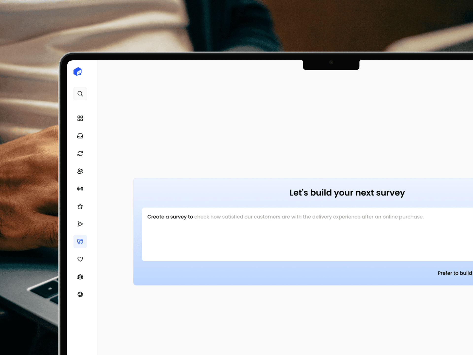 Screenshot of FeedbackRobot's AI-powered survey builder with a prompt field for generating surveys, displayed on a laptop.